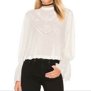 White flowy free people top size S. Worn once!